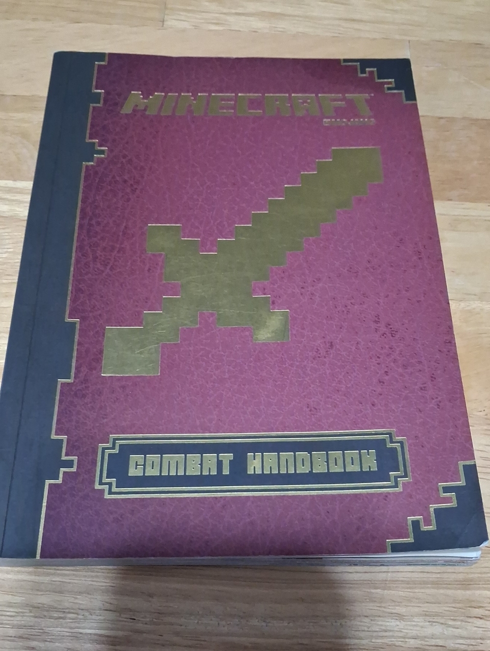Minecraft Official Combat Handbook - (Red, Gold) Softcover